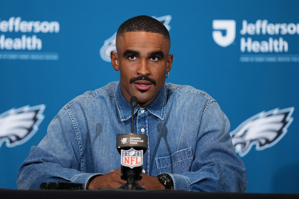 Philadelphia Eagles quarterback Jalen Hurts talks to the media following an NFL football game against the Washington Commanders, Sunday, Sept. 13, 2026, in Philadelphia. (AP Photo/Matt Rourke)