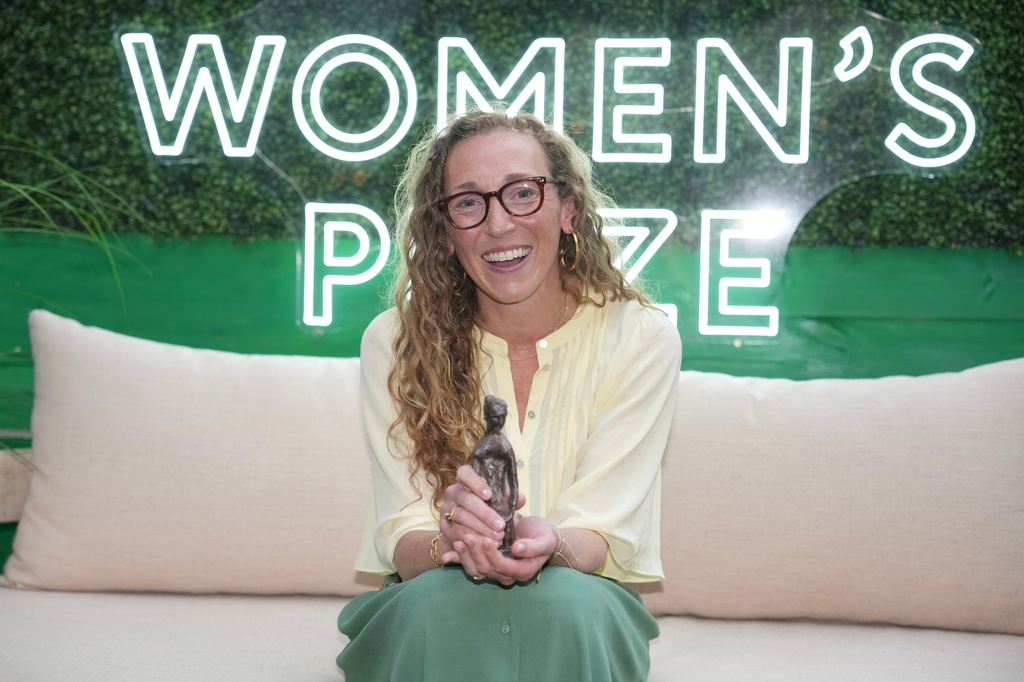 Virginia Evans, winner of The Women's Prize for fiction, poses for a photograph at the 2026 Women's Prize Trust Summer Party & Awards Ceremony in London, Thursday, June 11, 2026. (AP Photo/Kin Cheung)