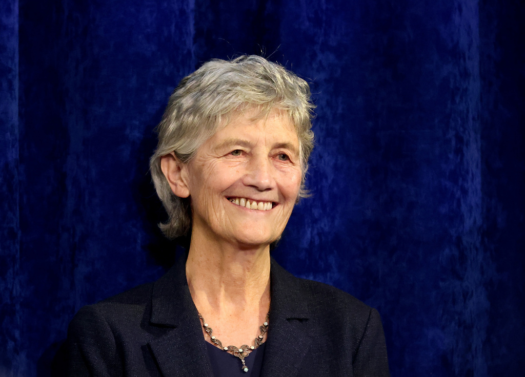 Catherine Connolly smiles to supporters after being elected as the new President of Ireland at Dublin Castle, Ireland, Saturday, Oct. 25, 2025. (AP Photo/Peter Morrison)