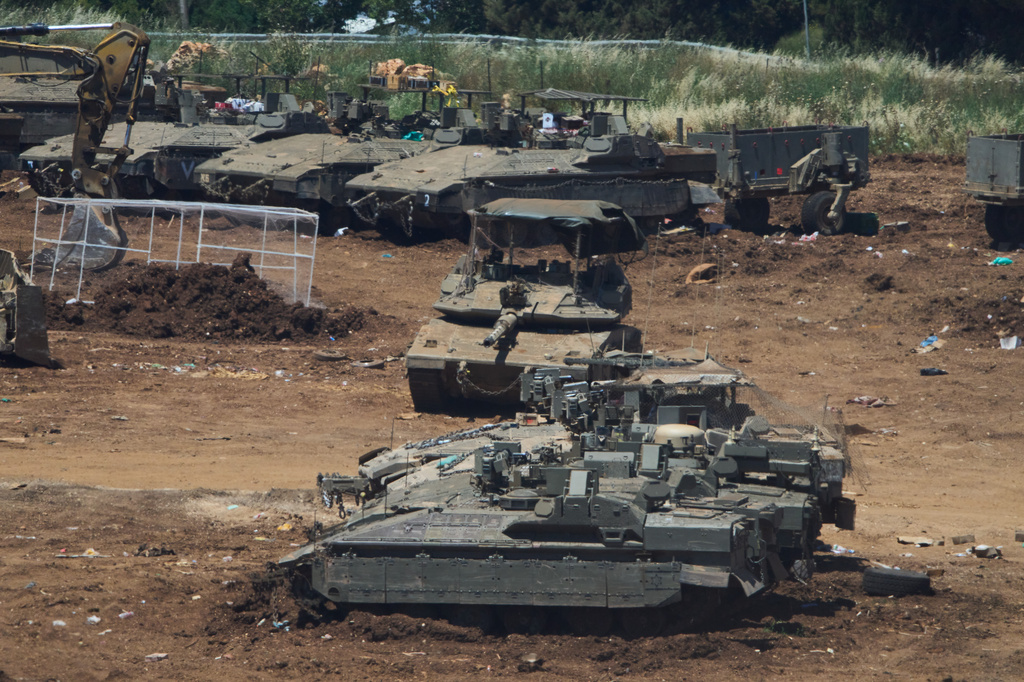 Israeli troops gather on the border with Lebanon in northern Israel, Tuesday, June 2, 2026. (AP Photo/Ariel Schalit)