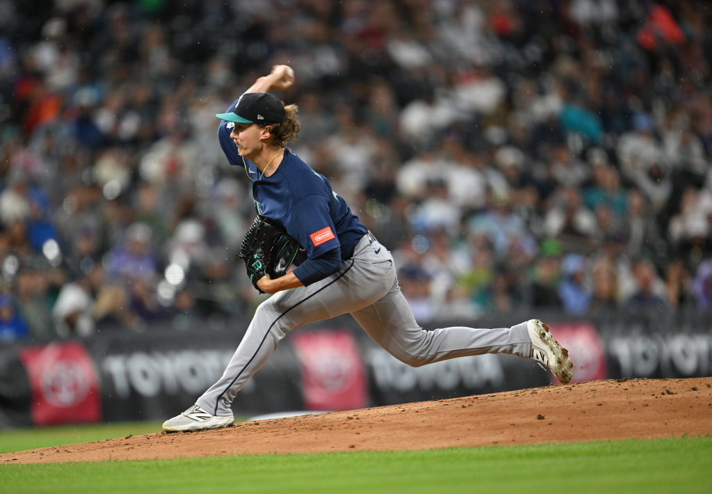 Seattle Mariners starting pitcher Bryce Miller works against the Colorado Rockies during the first inning of a baseball game Saturday, Sept. 19, 2026, in Denver. (AP Photo/RJ Sangosti)