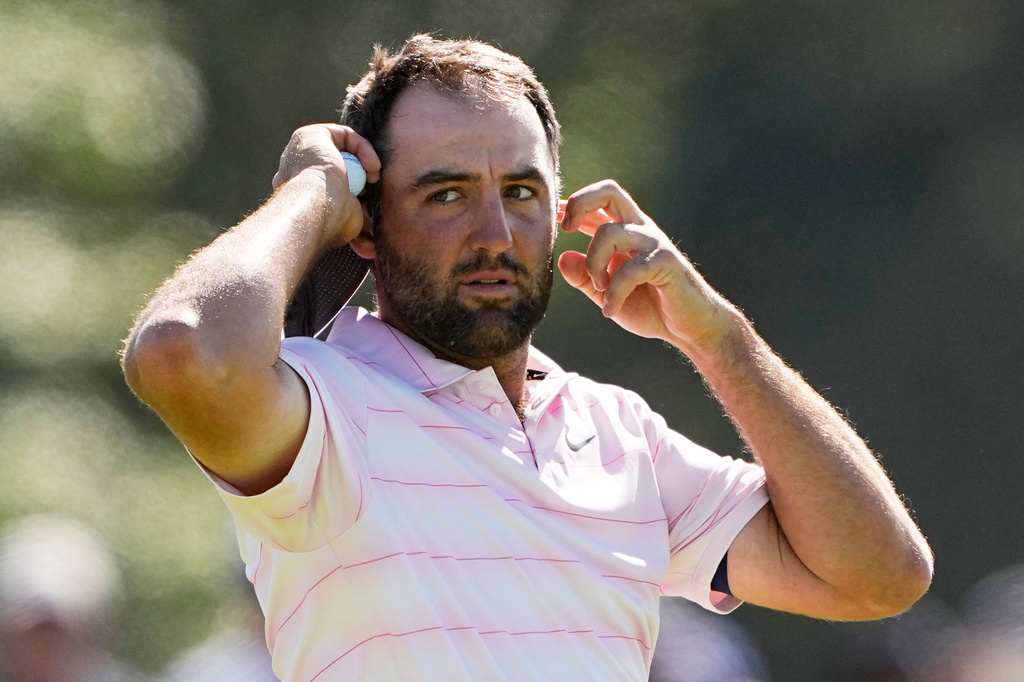 Scottie Scheffler waits to play on the eighth hole during the final round of the U.S. Open golf tournament at Shinnecock Hills Golf Club in Southampton, N.Y., Sunday, June 21, 2026. (AP Photo/Gerald Herbert)