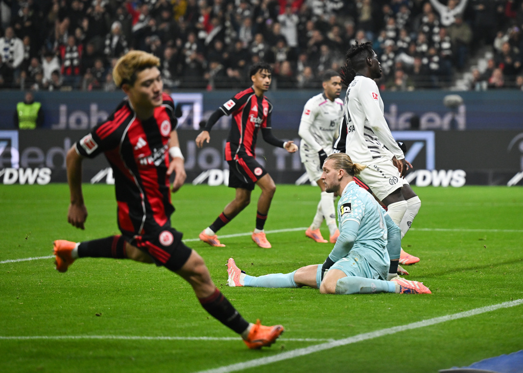 Frankfurt's Ritsu Doan celebrates after scoring during the German Bundesliga soccer match between Eintracht Frankfurt and FSV Mainz 05 in Frankfurt, Germany, Sunday, Nov. 9, 2025. (Arne Dedert/dpa via AP)