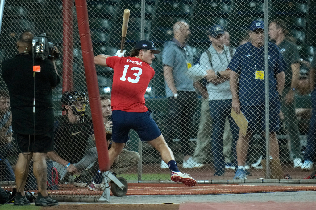 Cole Prosek, a third baseman/catcher at Magnolia Heights High School, gets ready to take a swing during batting practice at the MLB baseball combine in Phoenix, Tuesday, June 23, 2026. (AP Photo/Ross D. Franklin)