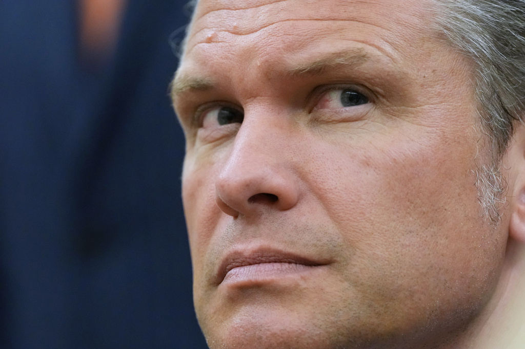 Secretary of Defense Pete Hegseth listens as President Donald Trump meets with Iraq's Prime Minister Ali al-Zaidi in the Oval Office of the White House, Tuesday, July 14, 2026, in Washington. (AP Photo/Julia Demaree Nikhinson)