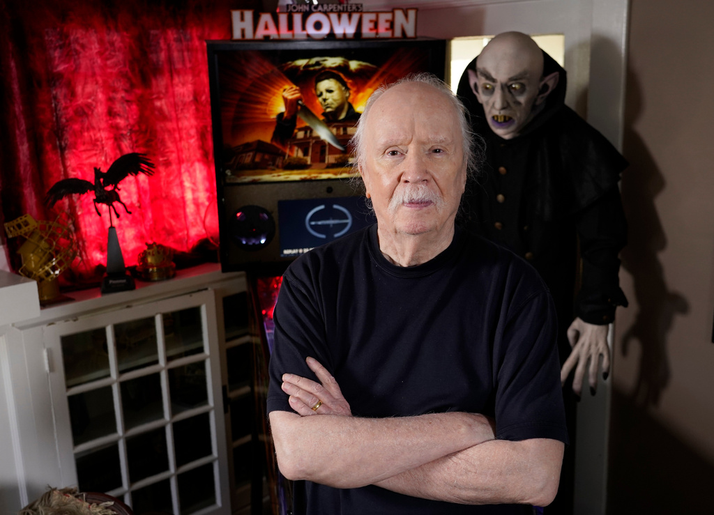 FILE - Author-filmmaker John Carpenter appears at his office in Los Angeles on Oct. 3, 2023. (AP Photo/Chris Pizzello, File)