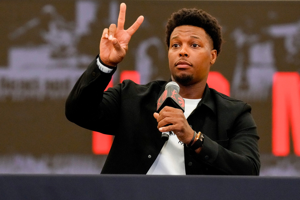 Kyle Lowry speaks at a press conference as he signs a one-day contract to retire as a Toronto Raptor, in Toronto, on Tuesday, July 7, 2026. (Chris Young/The Canadian Press via AP)