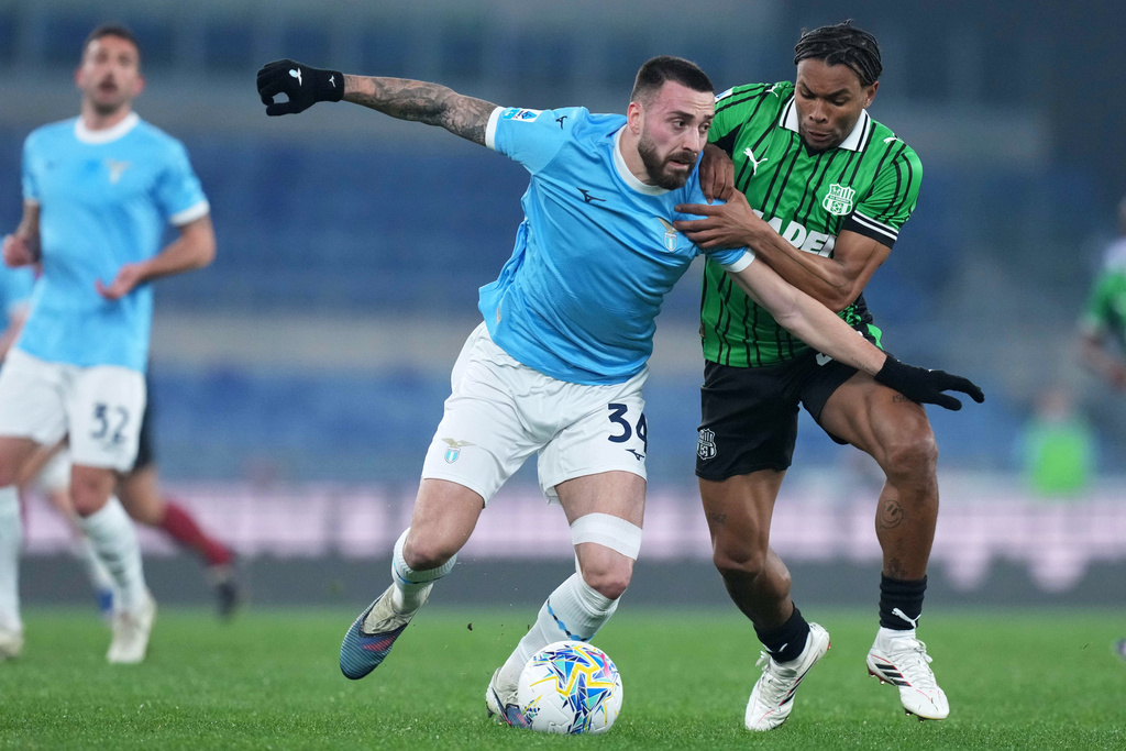Lazio's Mario Gila and Sassuolo's Armand Lauriente, right, in action during the Serie A soccer match between Lazio and Sassuolo in Rome, Italy, Monday March 9, 2026. (Alfredo Falcone/LaPresse via AP)