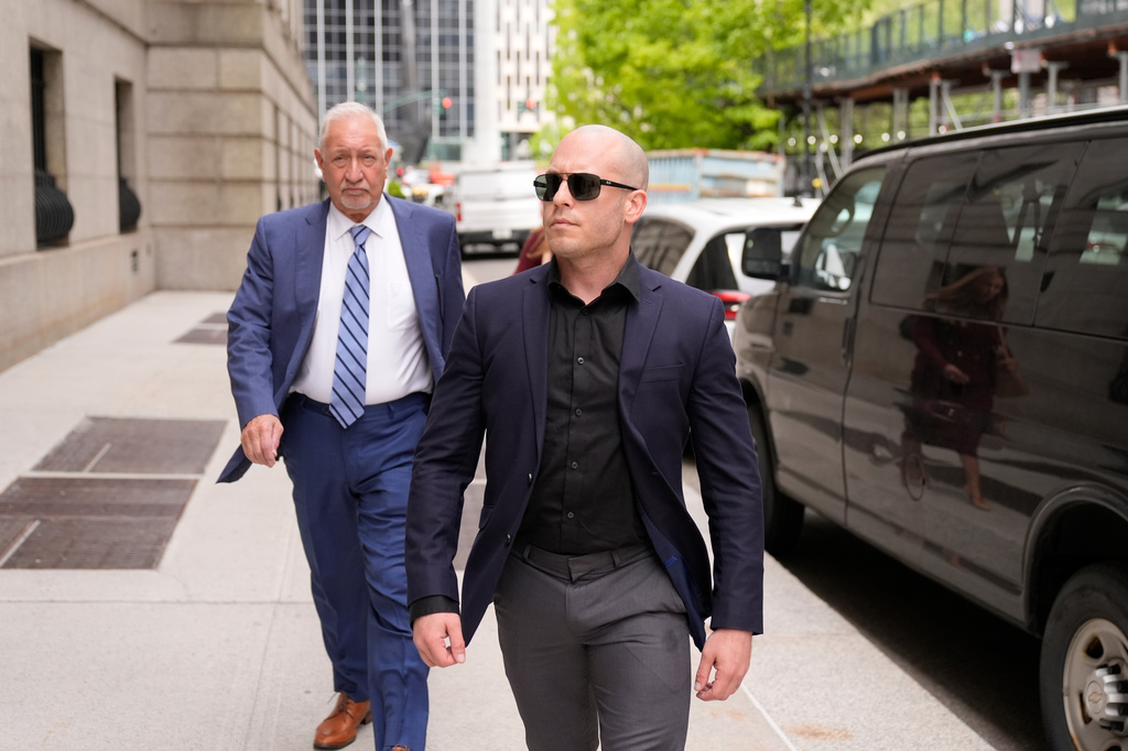 Gannon Ken Van Dyke, a soldier who is charged with using his access to classified information about the operation to capture Venezuelan President Nicolas Maduro in January to win money on Polymarket, walks near a federal court building in New York on Tuesday, April 28, 2026. (AP Photo/Seth Wenig)