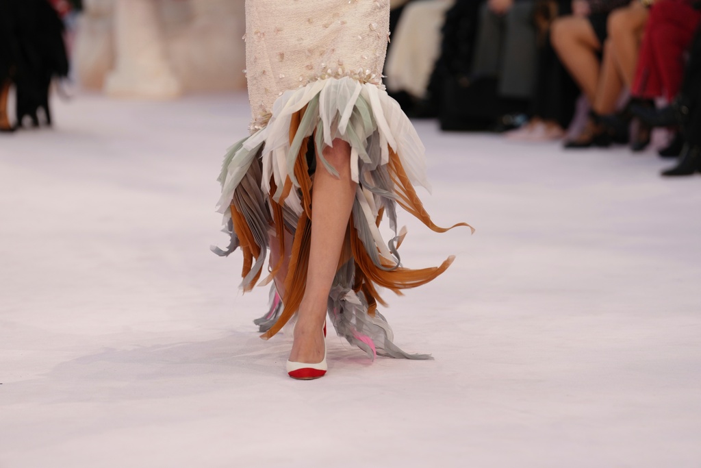 A model wears a creation as part of the Chanel Spring/Summer 2026 Haute Couture collection presented in Paris, Tuesday, Jan. 27, 2026. (AP Photo/Aurelien Morissard)