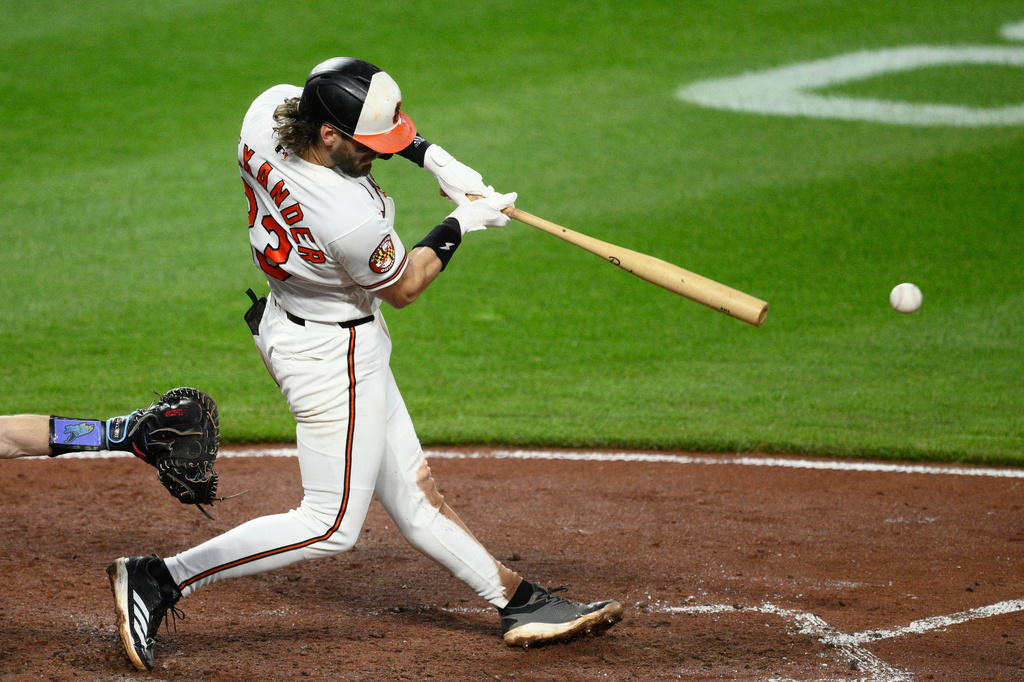 Baltimore Orioles' Blaze Alexander hits a double driving in two runs during the fifth inning of a baseball game against the Tampa Bay Rays, Wednesday, May 27, 2026, in Baltimore. (AP Photo/Nick Wass)