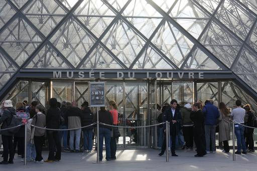 Visitors queue to enter the Louvre museum three days after historic jewels were stolen in a daring daylight heist, Wednesday, Oct. 22, 2025 in Paris. (AP Photo/Thibault Camus) Visitors queue to enter the Louvre museum three days after historic jewels were stolen in a daring daylight heist, Wednesday, Oct. 22, 2025 in Paris. (AP Photo/Thibault Camus)