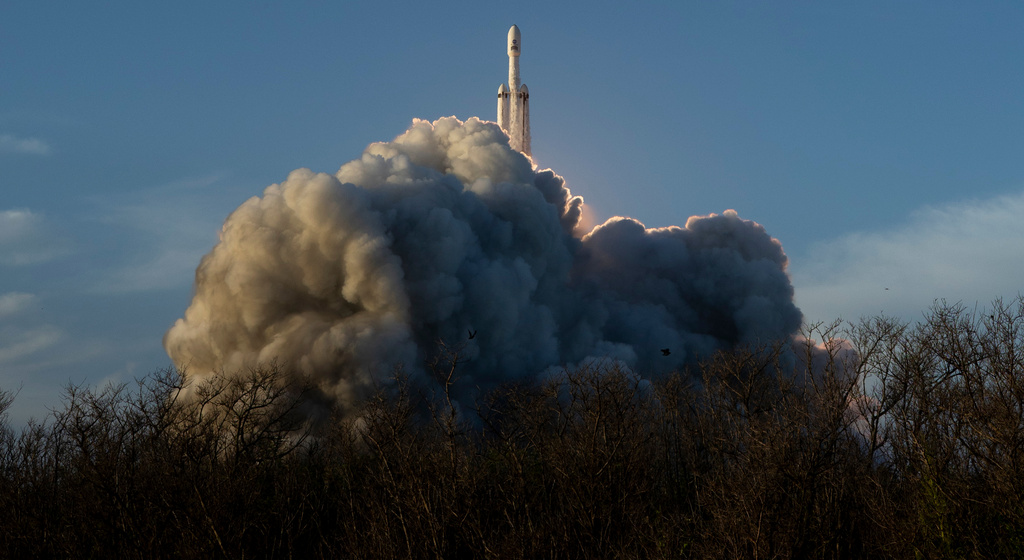 This image provided by NASA shows a SpaceX Falcon Heavy rocket with the space observatory Roman Telescope launching at the Kennedy Space Center in Cape Canaveral, Fla., Sunday, Aug. 30, 2026. (Joel Kowsky/NASA via AP)