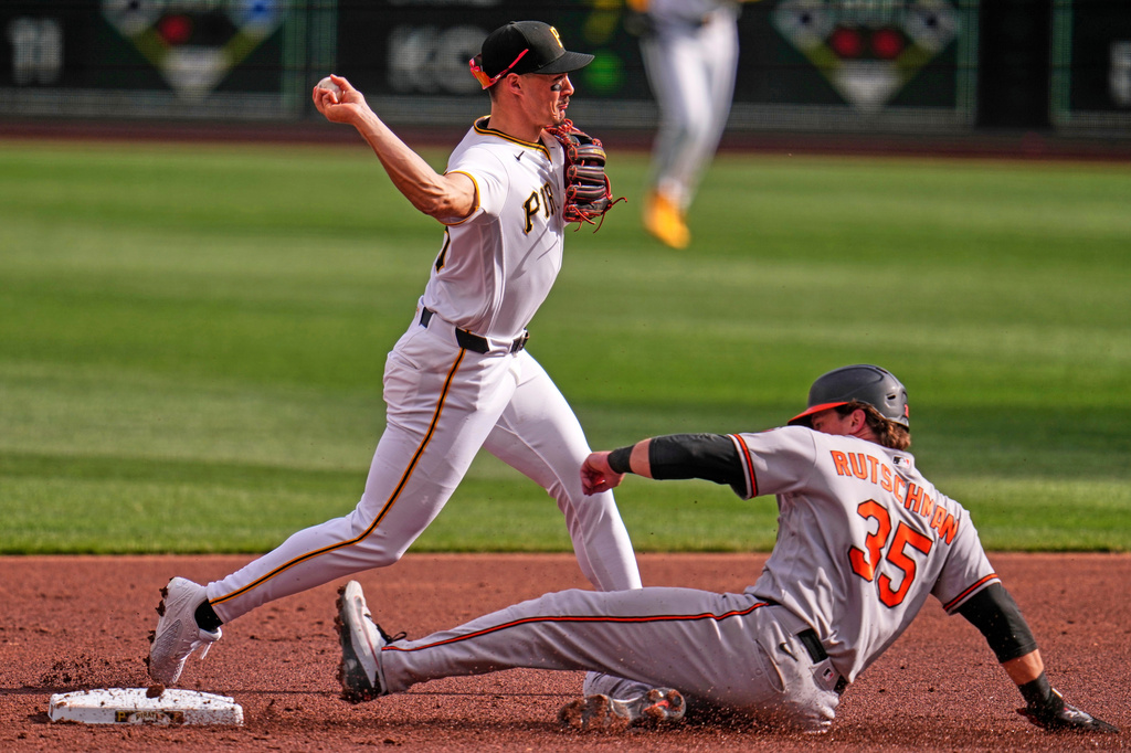 Pittsburgh Pirates shortstop Konnor Griffin gets the force out at second on Baltimore Orioles' Adley Rutschman (35) but fails to complete the double play on Dylan Beavers at first base during the second inning of a baseball game in Pittsburgh, Saturday, April 4, 2026. (AP Photo/Gene J. Puskar)