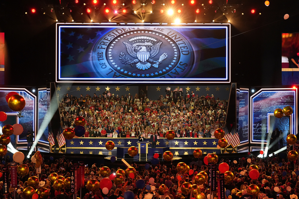 President Donald Trump stands by while Christopher Macchio, Presidential Tenor performs at the Republican convention, Thursday, Sept. 10, 2026, in Dallas. (AP Photo/Tony Gutierrez)