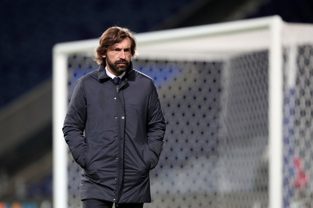 FILE - Juventus' head coach Andrea Pirlo stands on the pitch during warmup before the Champions League round of 16, first leg, soccer match between FC Porto and Juventus in Porto, Portugal, on Feb. 17, 2021. (AP Photo/Luis Vieira, File)