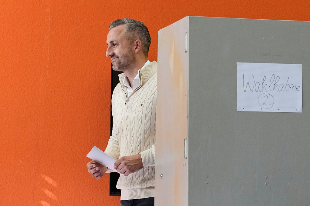 Ulrich Siegmund, top candidate for the "Alternative for Germany" (AfD) party votes at a polling station during the Saxony-Anhalt state elections in Tangermuende, eastern Germany, Sunday, Sept. 6, 2026. (AP Photo/Matthias Schrader)
