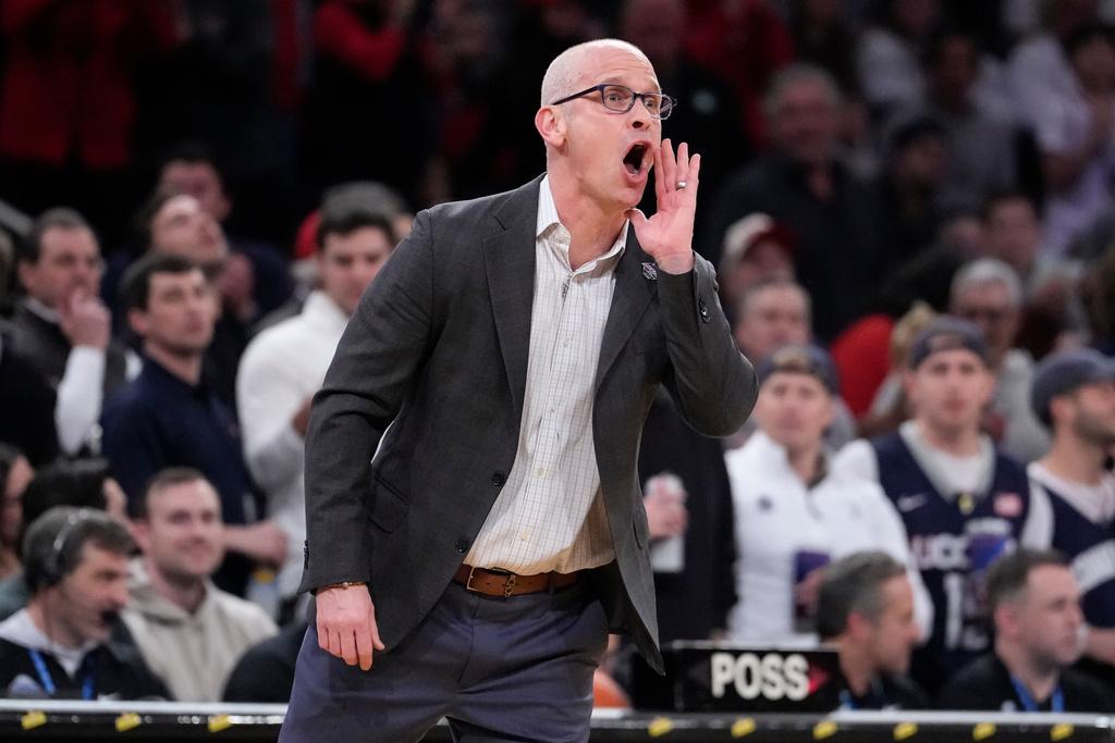 UConn head coach Dan Hurley screams during the first half of an NCAA college basketball game against St. John's in the championship of the Big East tournament, Saturday, March 14, 2026, in New York. (AP Photo/Yuki Iwamura)