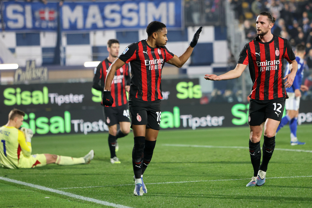 AC Milan's Christopher Nkunku celebrates scoring during the Serie A soccer match between Como and Milan in Como, Italy, Thursday Jan. 15, 2026. (Antonio Saia/LaPresse via AP)