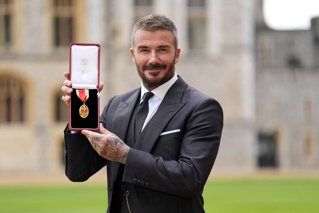 Sir David Beckham after he was made a Knight Bachelor at an investiture ceremony at Windsor Castle, Berkshire, England, Tuesday, Nov. 4, 2025. (Andrew Matthews/Pool Photo via AP)