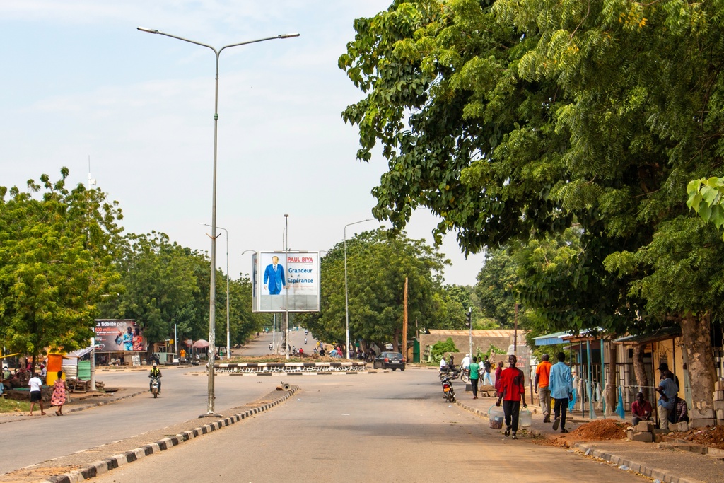People walk on the empty streets of Garoua, northern Cameroon, Tuesday, Nov. 4, 2025. (AP Photo/Pascal Welba Yamo )