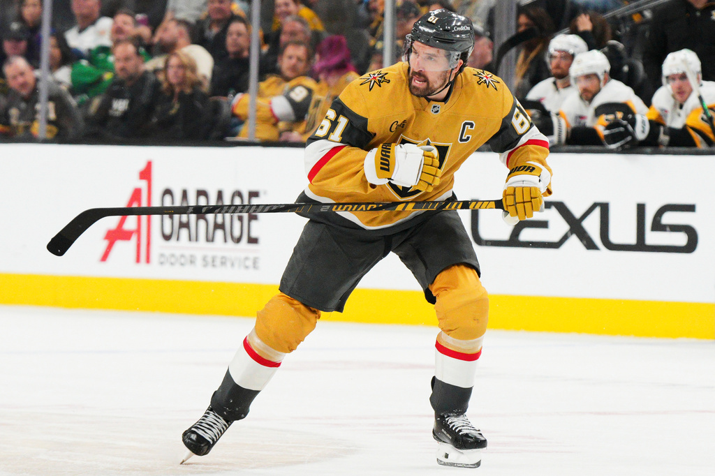 FILE - Vegas Golden Knights right wing Mark Stone skates against the Pittsburgh Penguins during the third period of an NHL hockey game, March 12, 2026, in Las Vegas. (AP Photo/Candice Ward, File)
