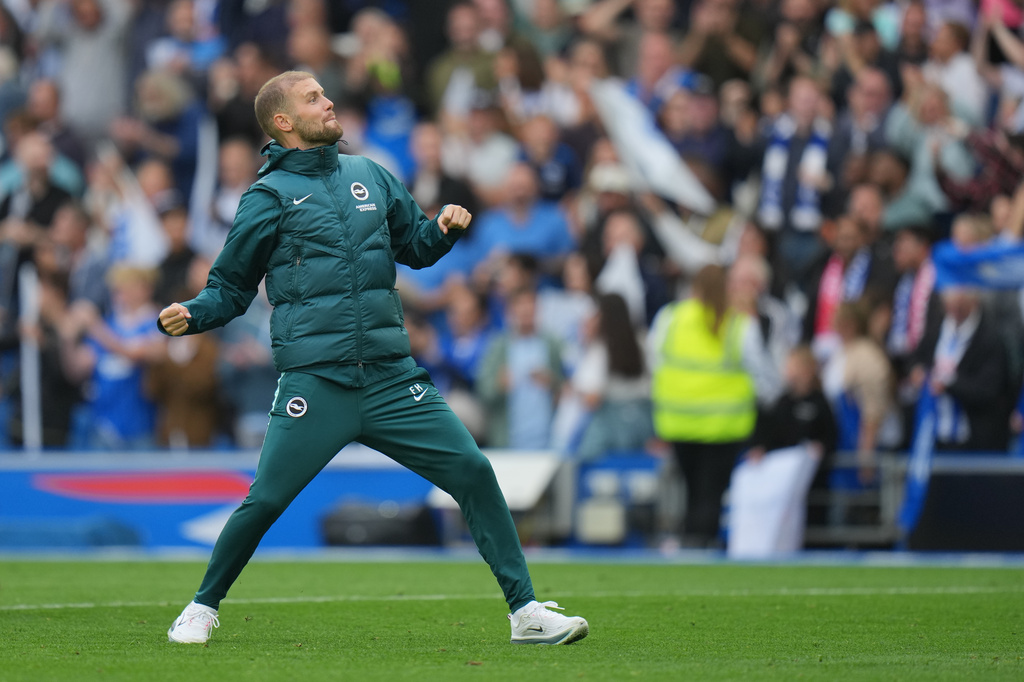 Brighton's head coach Fabian Huerzeler reacts after the English Premier League soccer match between Brighton & Hove Albion and Arsenal in Brighton, England, Saturday, Sept. 19, 2026. (AP Photo/Kin Cheung)