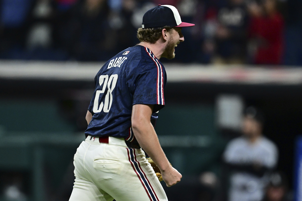 Cleveland Guardians starting pitcher Tanner Bibee reacts after the Guardians defeated the Chicago White Sox in a baseball game, Friday, Sept. 12, 2025, in Cleveland. (AP Photo/David Dermer)