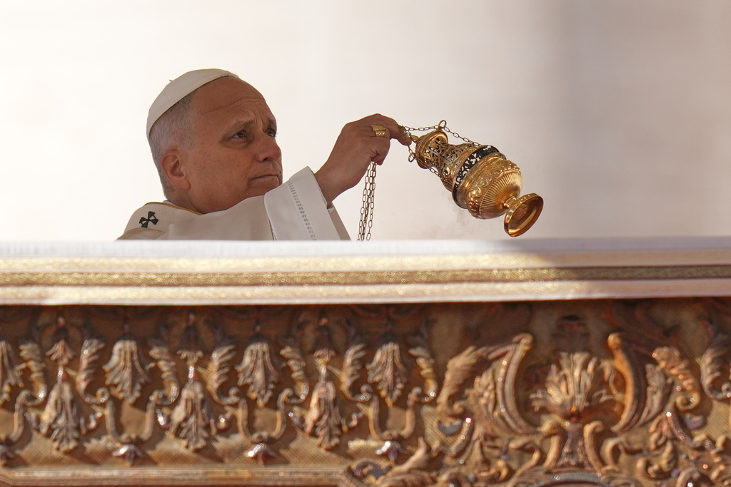 Pope Leo XIV attends a Mass for the Jubilee of the Choirs in St. Peter's Square, at the Vatican, Sunday, Nov. 23, 2025. (AP Photo/Alessandra Tarantino)