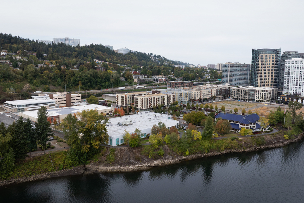 U.S. Immigration and Customs Enforcement facility, third from water at left, is seen on Thursday, Oct. 9, 2025, in Portland, Ore. (AP Photo/Jenny Kane)