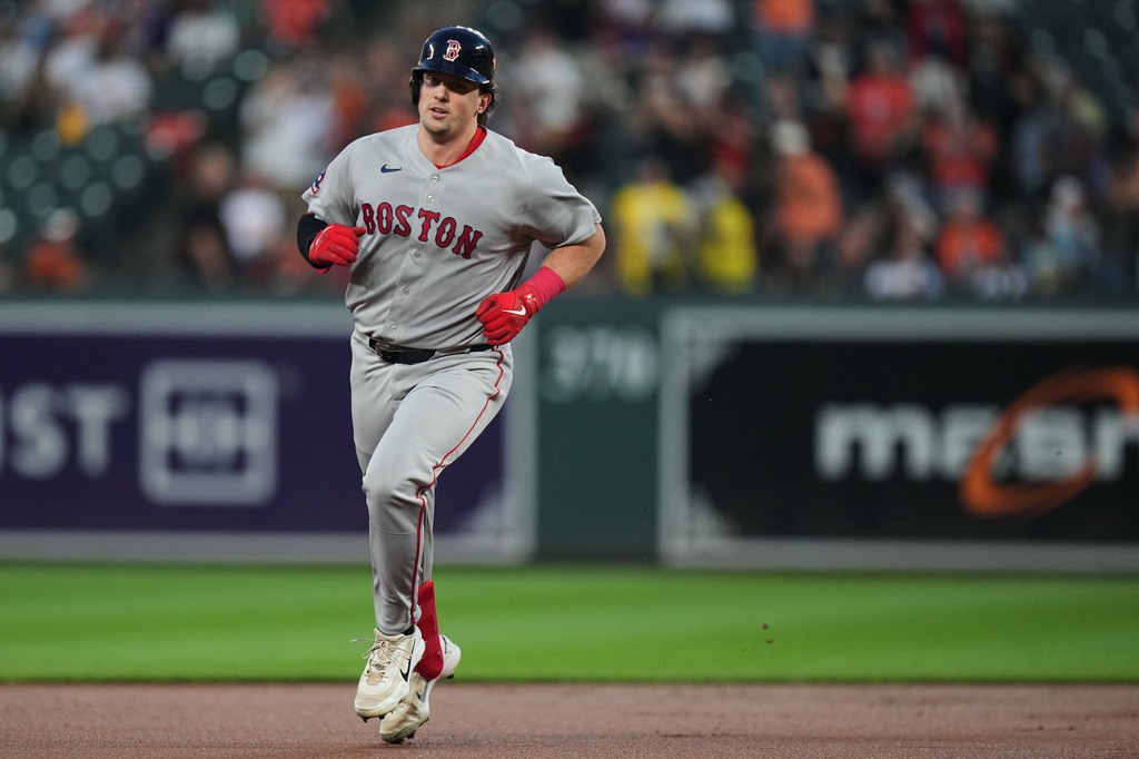 Boston Red Sox' Adley Rutschman rounds the bases after hitting a home run during the first inning of a baseball game against the Baltimore Orioles, Thursday, Sept. 3, 2026, in Baltimore. (AP Photo/Stephanie Scarbrough)