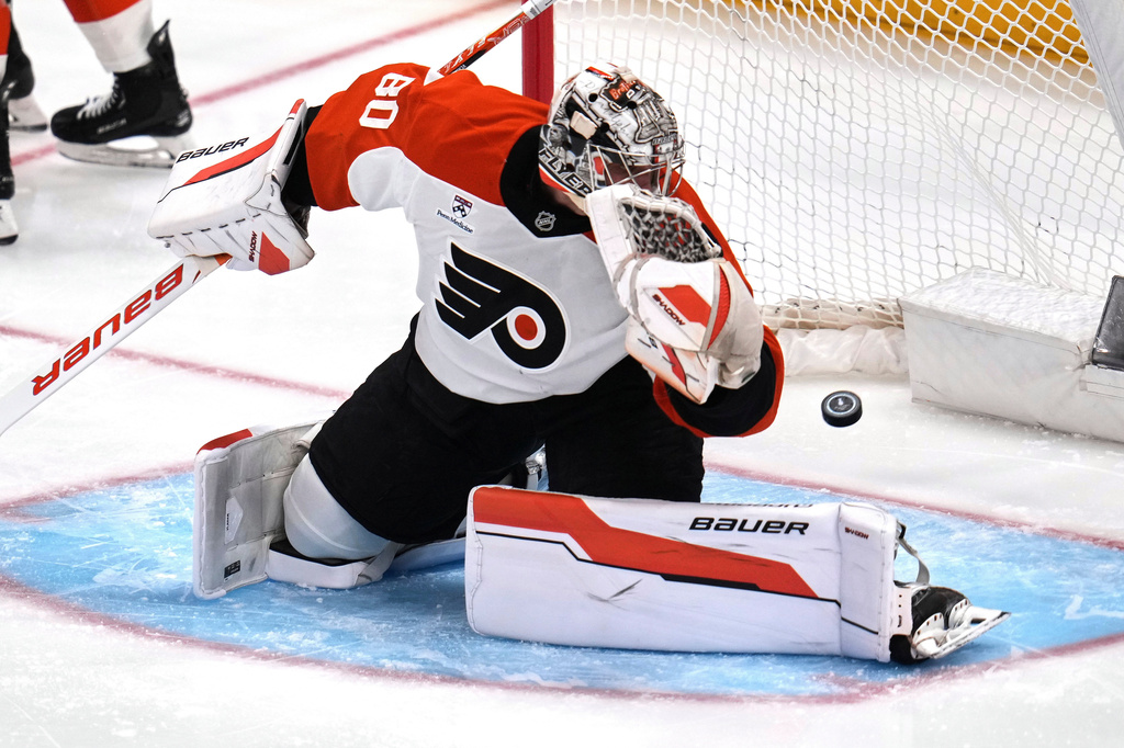 A shot by Pittsburgh Penguins' Elmer Soderblom gets past Philadelphia Flyers goaltender Dan Vladar (80) for a goal during the first period of Game 5 in the first round of an NHL hockey Stanley Cup playoff series in Pittsburgh, Monday, April 27, 2026. (AP Photo/Gene J. Puskar)