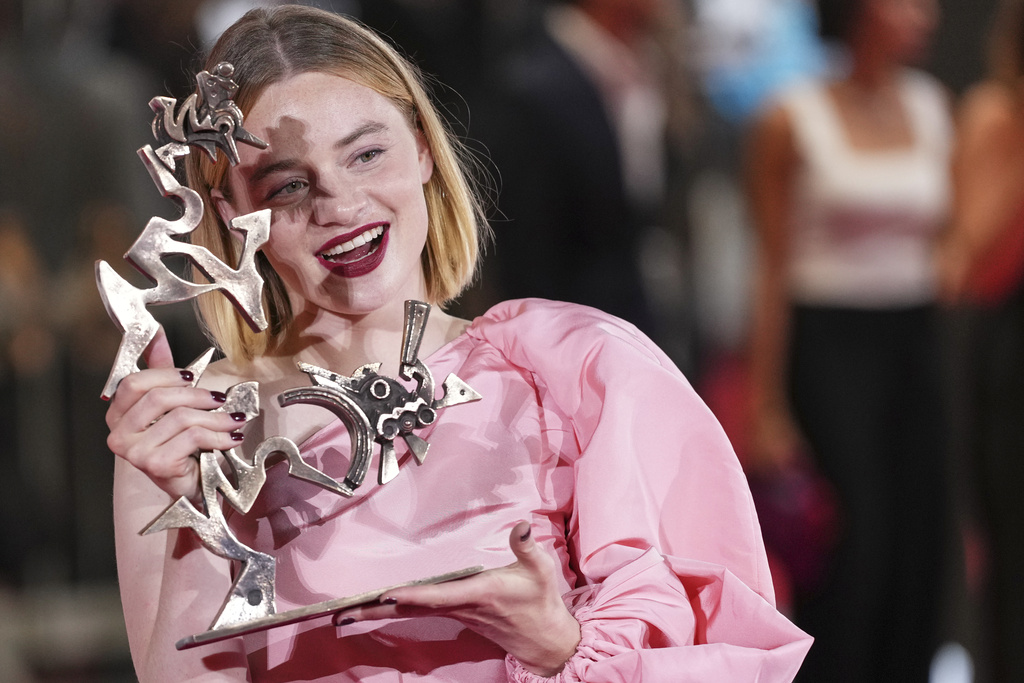 Luna Wedler, winner of the best young actress award for 'Silent Friend', poses for photographers at the awards photo call during the 82nd edition of the Venice Film Festival in Venice, Italy, on Saturday, Sept. 6, 2025. (Photo by Scott A Garfitt/Invision/AP)