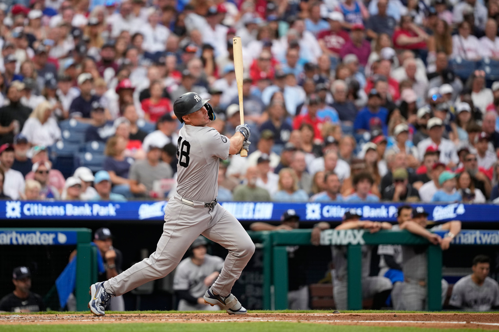 New York Yankees' Paul Goldschmidt follows through after hitting a home run against Philadelphia Phillies pitcher Jesús Luzardo during the fourth inning of a baseball game Friday, July 24, 2026, in Philadelphia. (AP Photo/Matt Slocum)