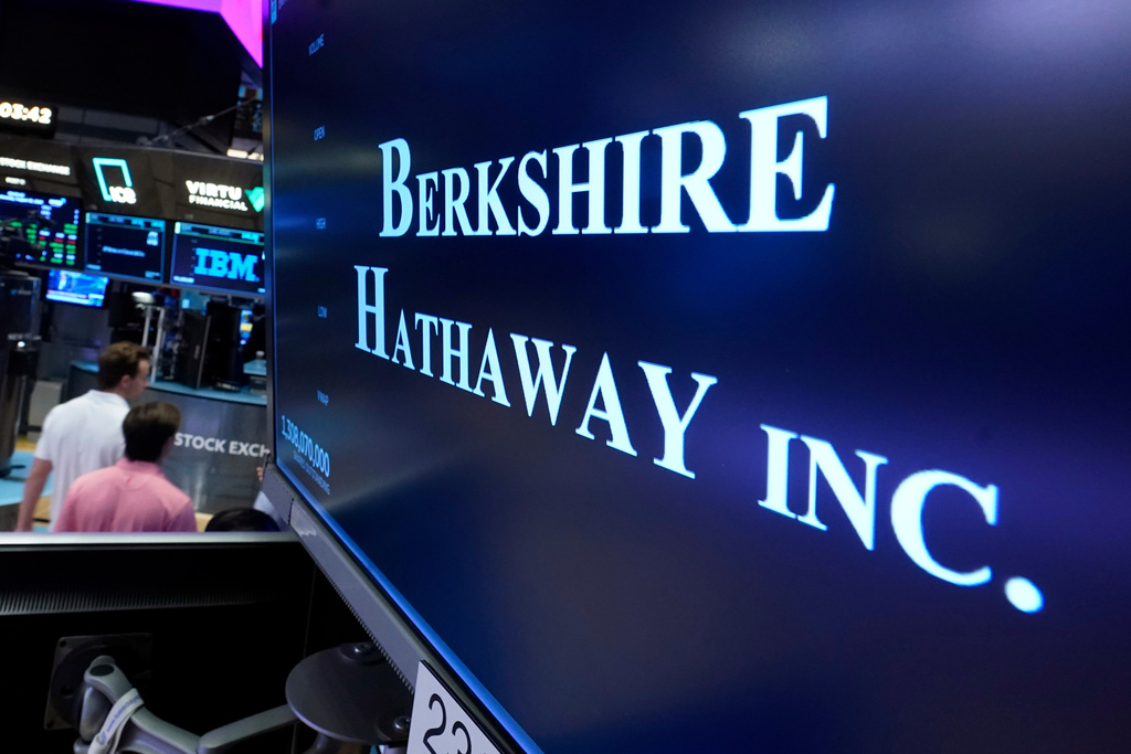 FILE - The logo for Berkshire Hathaway Inc. is displayed at a trading post on the floor of the New York Stock Exchange, Wednesday, Aug. 30, 2023. (AP Photo/Richard Drew, File)
