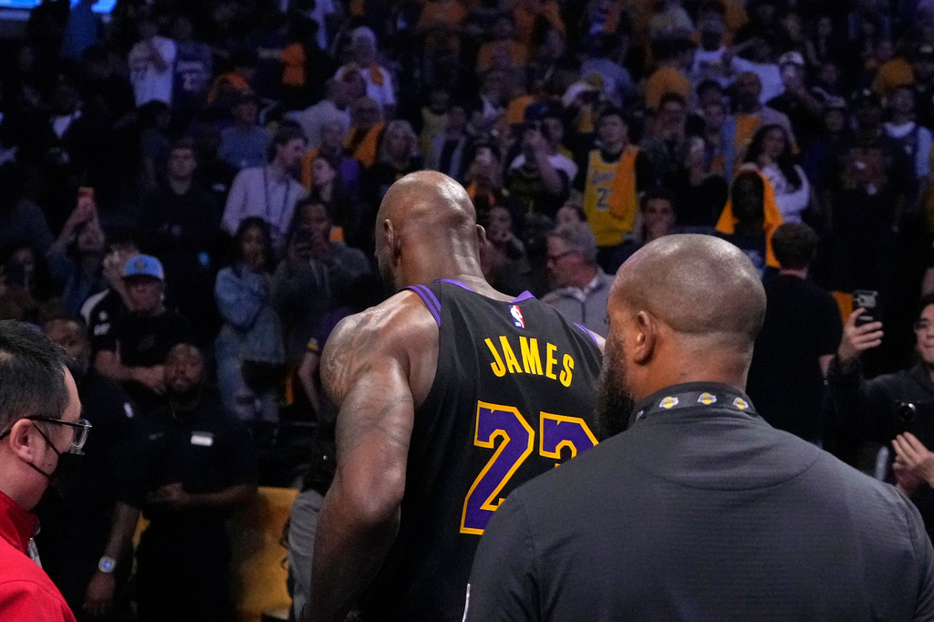 Los Angeles Lakers forward LeBron James walks off the court after the Lakers were defeated by the Oklahoma City Thunder in Game 4 in a second-round NBA basketball playoffs series Monday, May 11, 2026, in Los Angeles. (AP Photo/Mark J. Terrill)