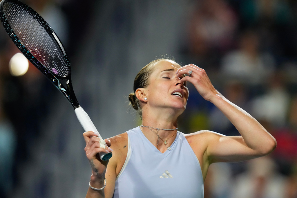 Ukraine's Elina Svitolina reacts after her loss to Poland's Iga Swiatek during a National Bank Open semifinal tennis match in Toronto on Wednesday, August 12, 2026. (Chris Young/The Canadian Press via AP)