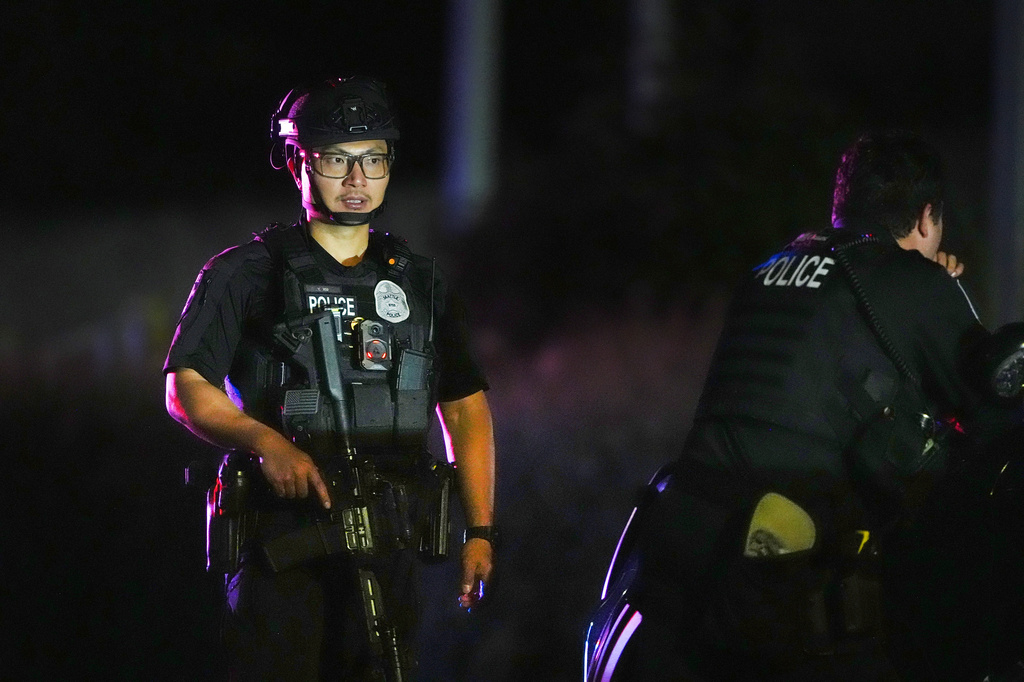 Seattle police respond to a shooting at Seattle Center during the Bite of Seattle food festival Sunday, July 26, 2026, in Seattle, Wash. (AP Photo/Lindsey Wasson)