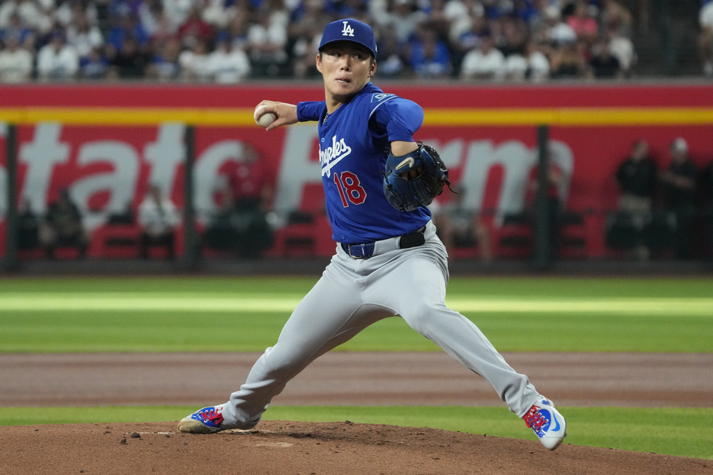 Los Angeles Dodgers pitcher Yoshinobu Yamamoto throws against the Arizona Diamondbacks in the first inning of a baseball game, Saturday, Aug. 8, 2026, in Phoenix. (AP Photo/Rick Scuteri)