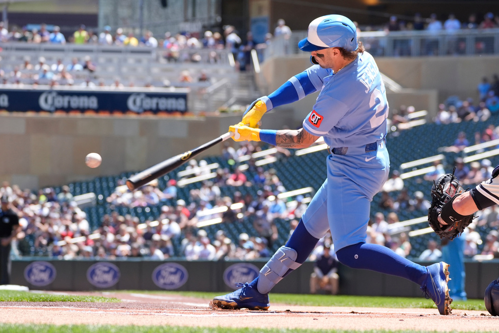 Kansas City Royals' Carter Jensen hits a solo home run in the first inning of a baseball game against the Minnesota Twins, Saturday, June 6, 2026, in Minneapolis. (AP Photo/Bruce Kluckhohn)