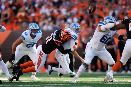 Cincinnati Bengals defensive end Trey Hendrickson (91) causes Detroit Lions quarterback Jared Goff (16) to fumble during the first half of an NFL football game Sunday, Oct. 5, 2025, in Cincinnati. (AP Photo/Carolyn Kaster) Cincinnati Bengals defensive end Trey Hendrickson (91) causes Detroit Lions quarterback Jared Goff (16) to fumble during the first half of an NFL football game Sunday, Oct. 5, 2025, in Cincinnati. (AP Photo/Carolyn Kaster)