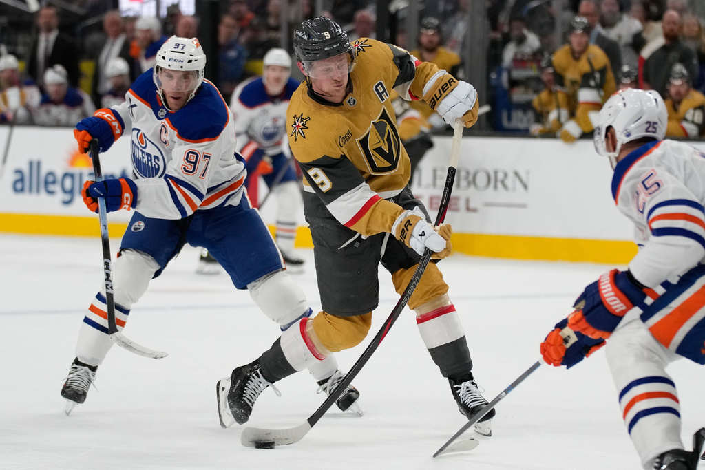 Vegas Golden Knights center Jack Eichel (9) shoots against the Edmonton Oilers during the second period of an NHL hockey game Sunday, March 8, 2026, in Las Vegas. (AP Photo/John Locher)