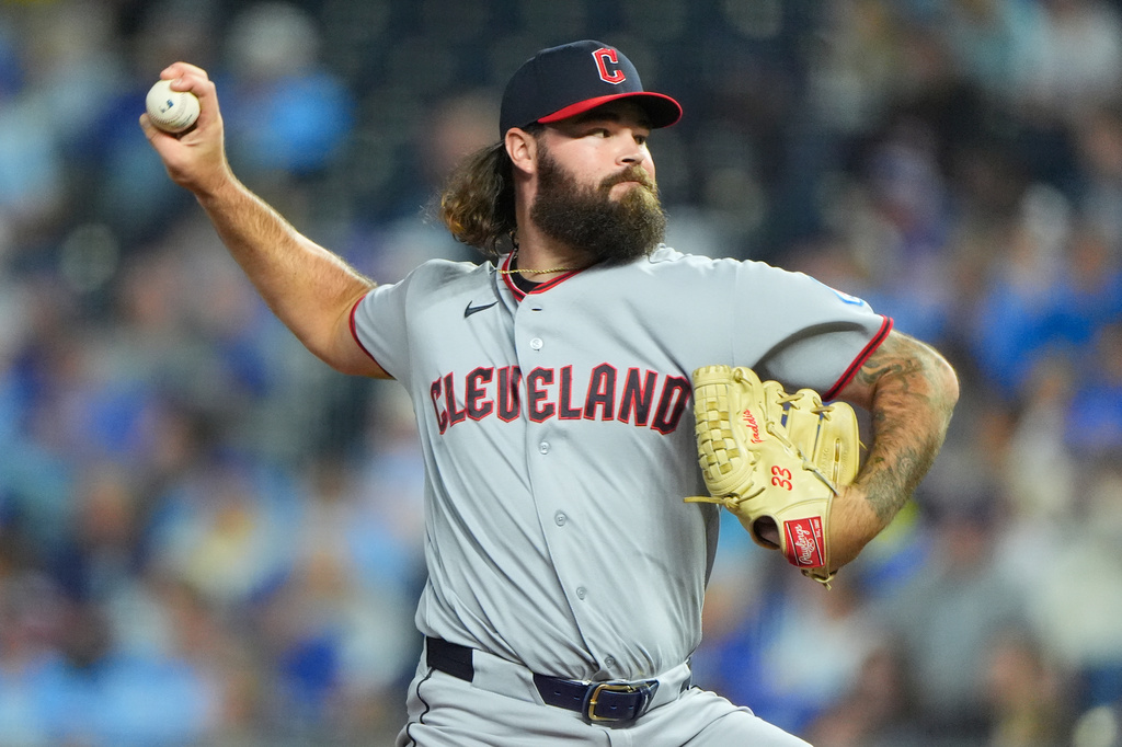 Cleveland Guardians pitcher Hunter Gaddis throws during the eighth inning of a baseball game, Friday, Sept. 25, 2026, in Kansas City, Mo. (AP Photo/Charlie Riedel)