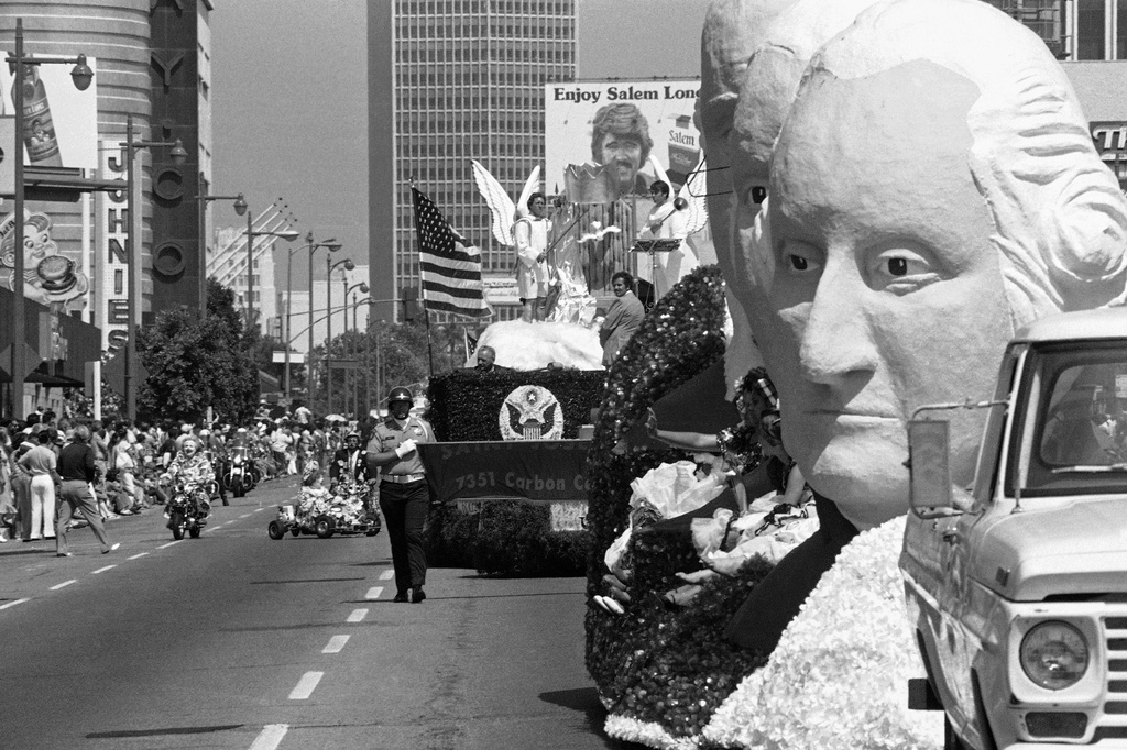 FILE - Floats and participants in the 10.8-mile All Nation, All People Official Los Angeles County Bicentennial Parade along Wilshire Boulevard in Los Angeles, Sunday, July 4, 1976. (AP Photo/File)