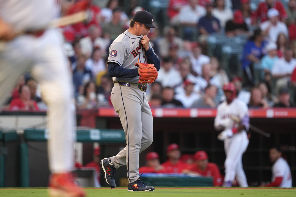 Houston Astros pitcher Kai-Wei Teng (17) walks back to the mound after giving up a 2-run double to Los Angeles Angels Wade Meckler during the second inning of a baseball game Tuesday, June 9, 2026, in Anaheim, Calif. (AP Photo/Scott Strazzante)