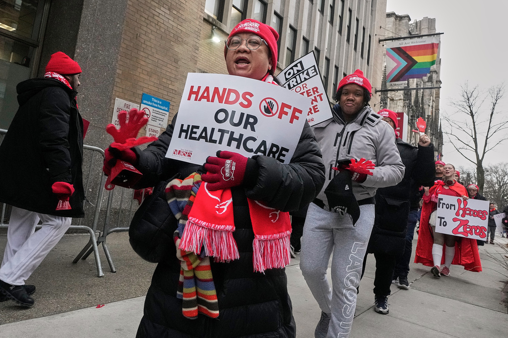 Striking nurses demonstrate outside Mt. Sinai Morningside Hospital, in New York, Wednesday, Jan. 14, 2026. (AP Photo/Richard Drew)
