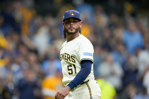 Milwaukee Brewers pitcher Freddy Peralta walks to the dugout after the top of the fifth inning in Game 2 of baseball's National League Championship Series against the Los Angeles Dodgers, Tuesday, Oct. 14, 2025, in Milwaukee. (AP Photo/Brynn Anderson) Milwaukee Brewers pitcher Freddy Peralta walks to the dugout after the top of the fifth inning in Game 2 of baseball's National League Championship Series against the Los Angeles Dodgers, Tuesday, Oct. 14, 2025, in Milwaukee. (AP Photo/Brynn Anderson)