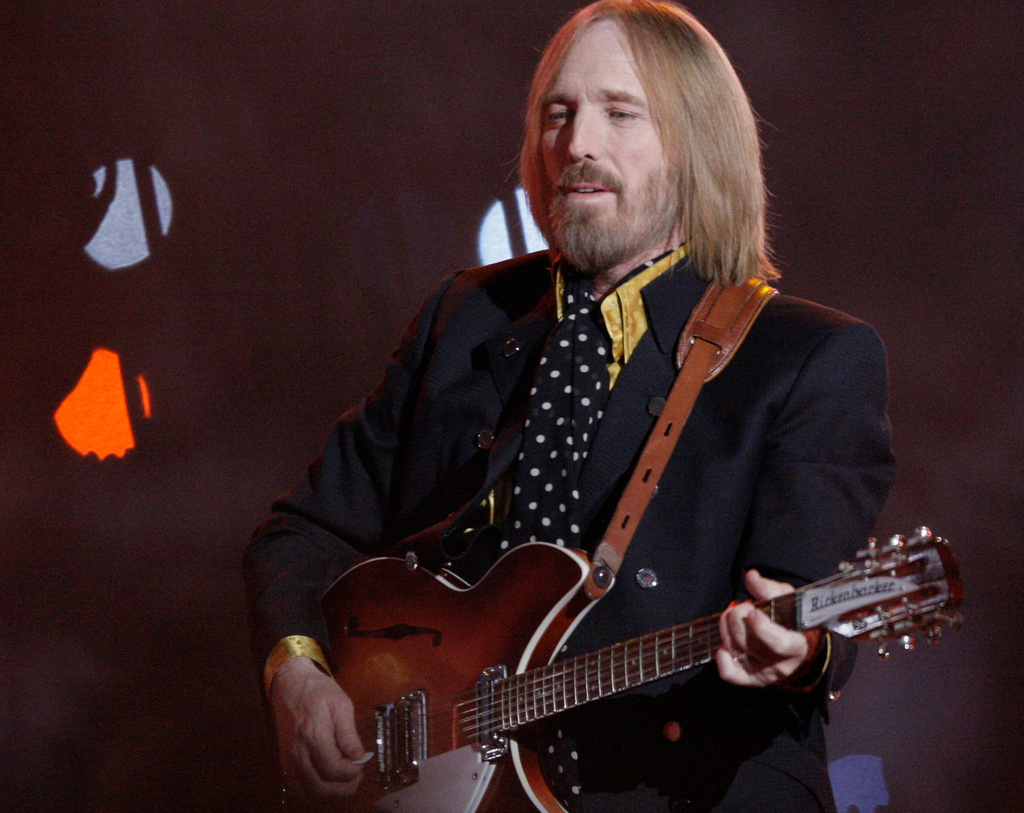 FILE - In this Sunday, Feb. 3, 2008 file photo, Tom Petty, of Tom Petty and the Heartbreakers, performs during halftime of the Super Bowl XLII football game between the New York Giants and the New England Patriots in Glendale, Ariz. (AP Photo/David J. Phillip, File)