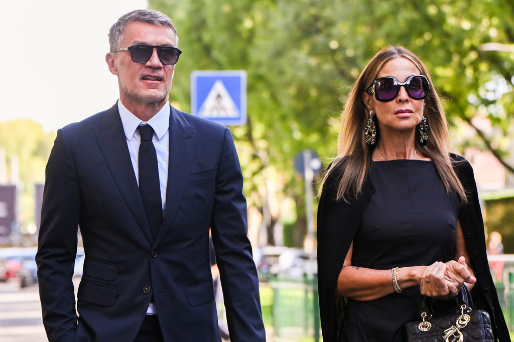 FILE - Paolo Maldini arrives with his wife, Adriana Fossa, at the Armani/Teatro in Milan, northern Italy, to pay his respects to designer Giorgio Armani, Sept. 7, 2025. (AP Photo/Nicola Marfisi, File)