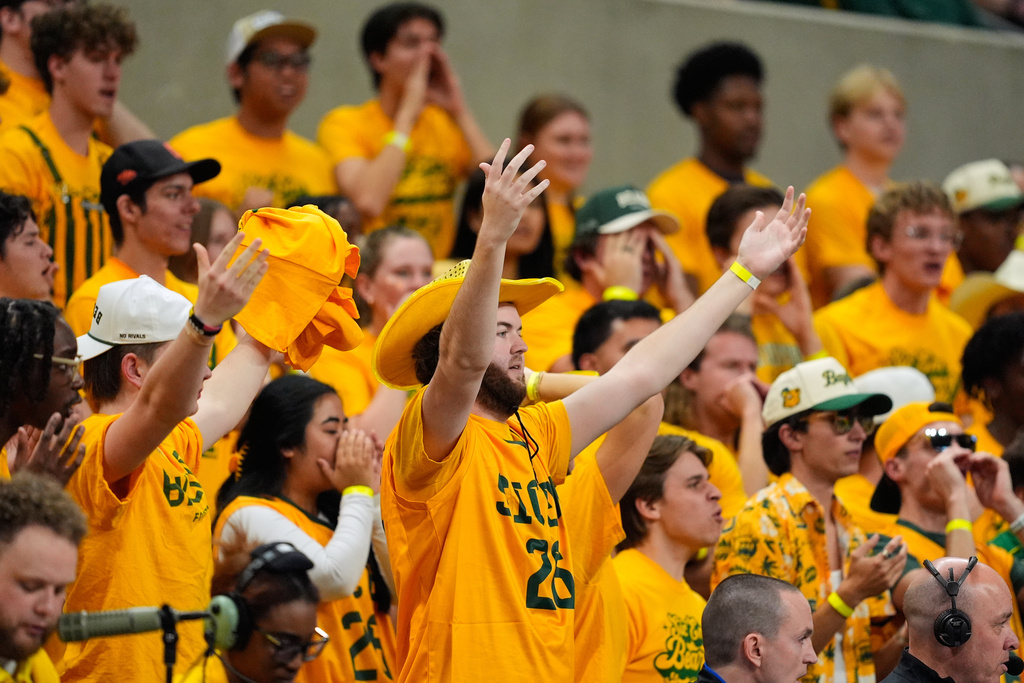 Baylor fans react to play in the second half of an NCAA college basketball game against BYU Tuesday, Feb. 10, 2026, in Waco, Texas. (AP Photo/Tony Gutierrez)